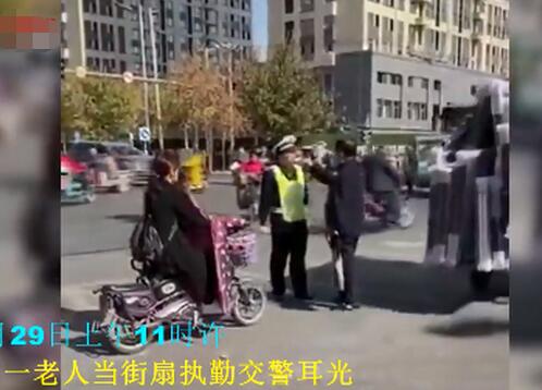 老人闯红灯被阻